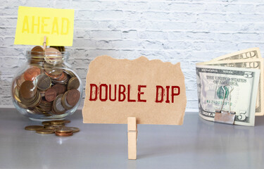 Paper note with text double dip, business