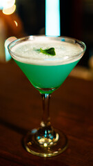 Hugo cocktail, summer italian aperitif made with Prosecco sparkling wine, lime, mint and elderflowers syrup, green martini