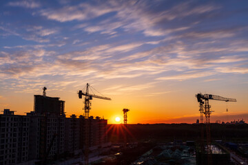 The construction site is in the evening - obrazy, fototapety, plakaty