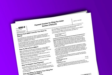 Obraz premium Form 8283-V documentation published IRS USA 10.28.2013. American tax document on colored