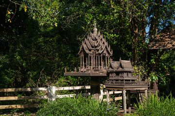 Old wooden structure of the spirit house or Shrine of the household god, Phra Phum Shrine, Joss...