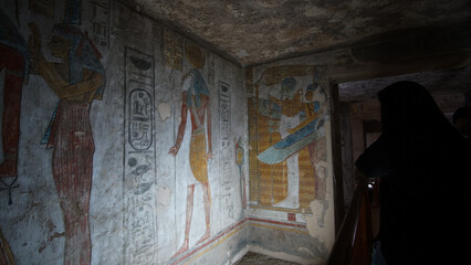 Fototapeta na wymiar Valley of the kings Luxor Egypt Tomb of Tausert and Setnakht heiroglyphic painting with pastel color beautiful yellow and blue fresco style