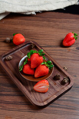 strawberries on a wooden table