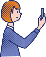 スマホで映え写真を撮る女性