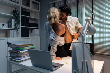 Caucasian businessman and woman foreplay and making love in the office.  - obrazy, fototapety, plakaty
