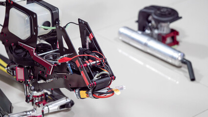 Fototapeta premium engine of an RC plane, he is repairing it.