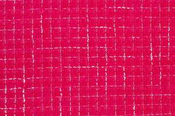 Boucle suiting fabric background texture. Pink color of the season