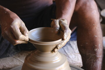 9 October 2022, Pune, India, Indian potter making Diya (oil lamps) or earthen lamps for Diwali Festival with clay, Handwork craft.