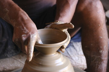 9 October 2022, Pune, India, Indian potter making Diya (oil lamps) or earthen lamps for Diwali Festival with clay, Handwork craft.