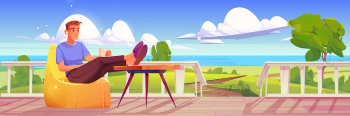 Man rest in bean bag chair on wooden porch or terrace with view to green meadows and sea coast. Lake shore landscape with person relax with cup on house veranda, vector cartoon illustration