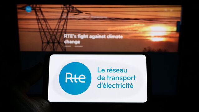 Stuttgart, Germany - 10-01-2022: Person holding cellphone with logo of Reseau de Transport d'Electricite S.A. (RTE) on screen in front of business webpage. Focus on phone display.