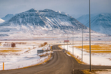 On the road to Akureyri encompass with snow mountain on Ring road during winter at Akureyri , North of Iceland : 18 March 2020 - obrazy, fototapety, plakaty