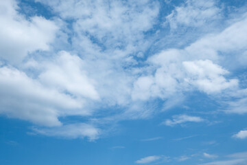 Blue sky background and white clouds soft focus