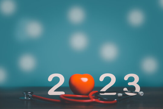 2023 with red heart and stethoscope,  health care, health insurance, healthy life concept, copy space for banner.