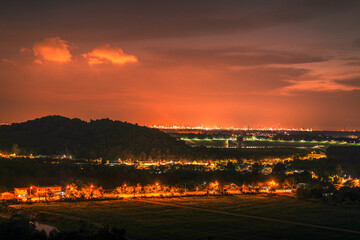 High angle nature background on the mountain overlooking the evening sky changing colors at night, with the blur of the wind and the passing leaves, seen at various tourist spots and viewpoints.