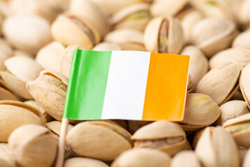 Flag of Ireland on pistachio nuts. Growing pistachios in Ireland concept