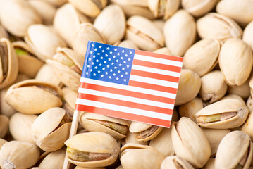Flag of USA on pistachio nuts. Growing pistachios in United States concept