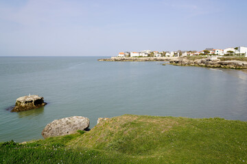 Fototapeta na wymiar beach atlantic ocean view with city Saint-Palais-sur-Mer