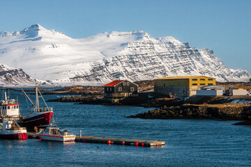 Beautiful view of Djúpivogur Small port towns on the shores of Berufjörður  during winter sunny day at Djúpivogur , Peninsula near Austurland East of Iceland : 19 March 2020