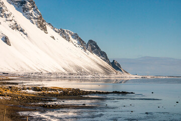 Along the way to Hofn and Stokksnes with snow mountain and beautiful nature during winter sunny day near Hofn , Southeastern Coast of Iceland  : 19 March 2020