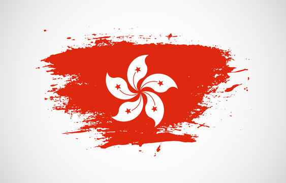 Grunge brush stroke with the national flag of Hong Kong on a white isolated background