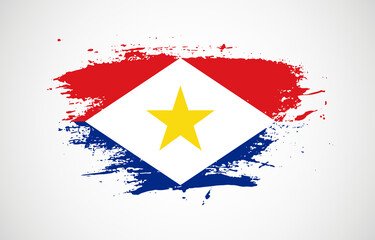 Grunge brush stroke with the national flag of Saba on a white isolated background
