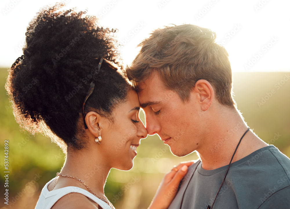 Wall mural embrace, love and interracial couple on holiday in nature, happy in marriage and smile for summer in