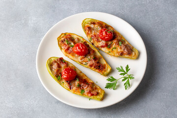 Zucchini stuffed with meat, vegetables and cheese. Zucchini boats. Turkish name; kabak sandal