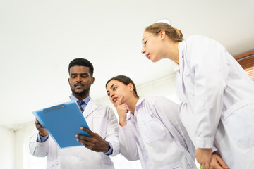 Scientists are taking notes. Happy teams of scientists experiment and research. international group of scientists. scientist teamwork.