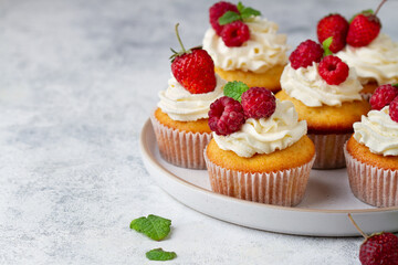Cupcakes with berries, copy space