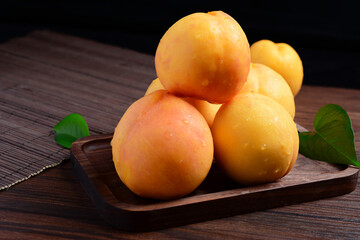 Yellow peach on a table