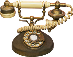 An old and used vintage ivory and golden colored home telephone,  a collectible object to remember...