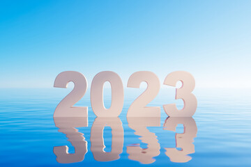 2023 number on blue sea abstract background. Happy new year concept.