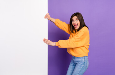 Photo of astonished overjoyed lady hand hold empty space placard information news black friday...