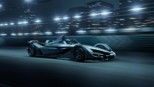 Fast Accelerating High Performance Electric Racing Car is Driving on Track at Night Time.