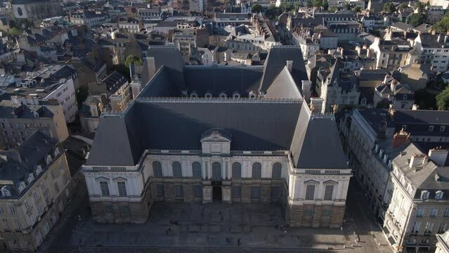 Brittany Parliament in Rennes city center, France. Aerial backward tilt-up reveal