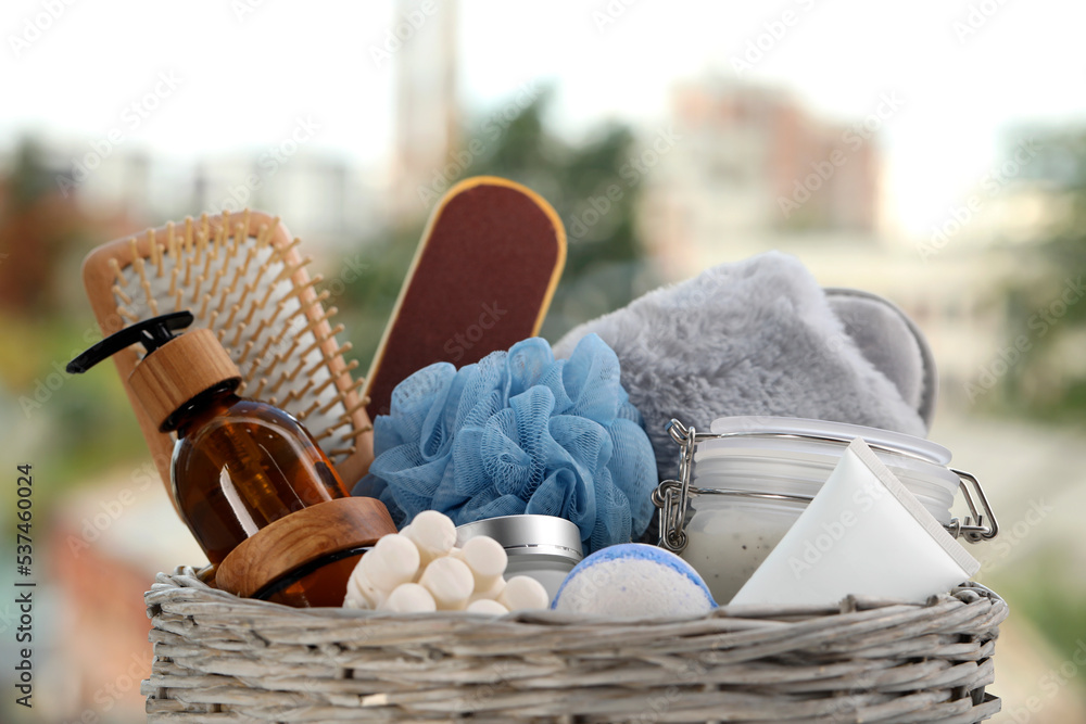 Sticker Spa gift set with different products on blurred background, closeup