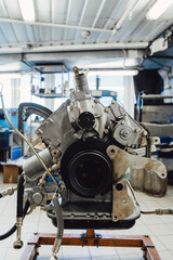 Overhaul of the motor for the car. Parts of an internal combustion engine. Cylinder block with...