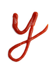 Letter Y written with ketchup on white background