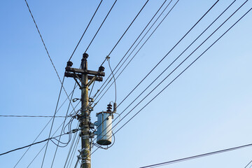 lines on a sky, power pole, electric poles, power lines on a blue sky background