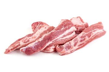 Pork fillet tenderloin with lettuce, raw meat, close-up, isolated on white background.