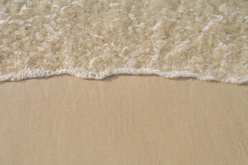 water waves bubbles on the beach