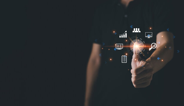 Man touching futuristic digital processing of biometric identification fingerprint scanner for access personal financial data. surveillance and security scanning of digital programs cyber futuristic