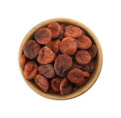 Wooden bowl with dried tasty apricots isolated on white, top view