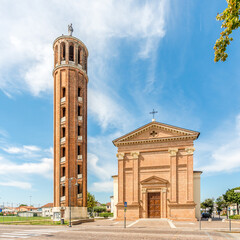 Fototapeta na wymiar View at the Church of Saint Michael Archangel with round Bell tower in Quarto d Altino, Italy