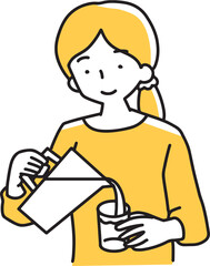 コップに飲み物を入れる女性