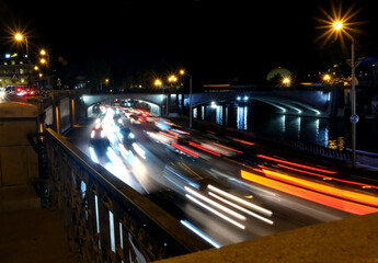 Night traffic on the embankment of the Kura River