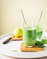 Healthy green smoothie, spinach, lemon.
