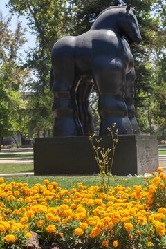 Vertical Shot Of As Sculpture Of A Fat Horse From Fernando Botero In Santiago Do Chile