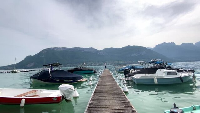 Walking On The Jetty With Moored Boats At Lake Annecy In Annecy, France. - POV